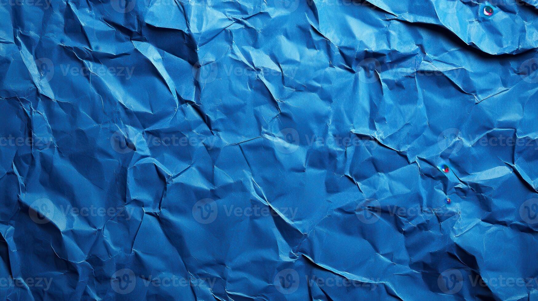 Crumpled blue paper background photo
