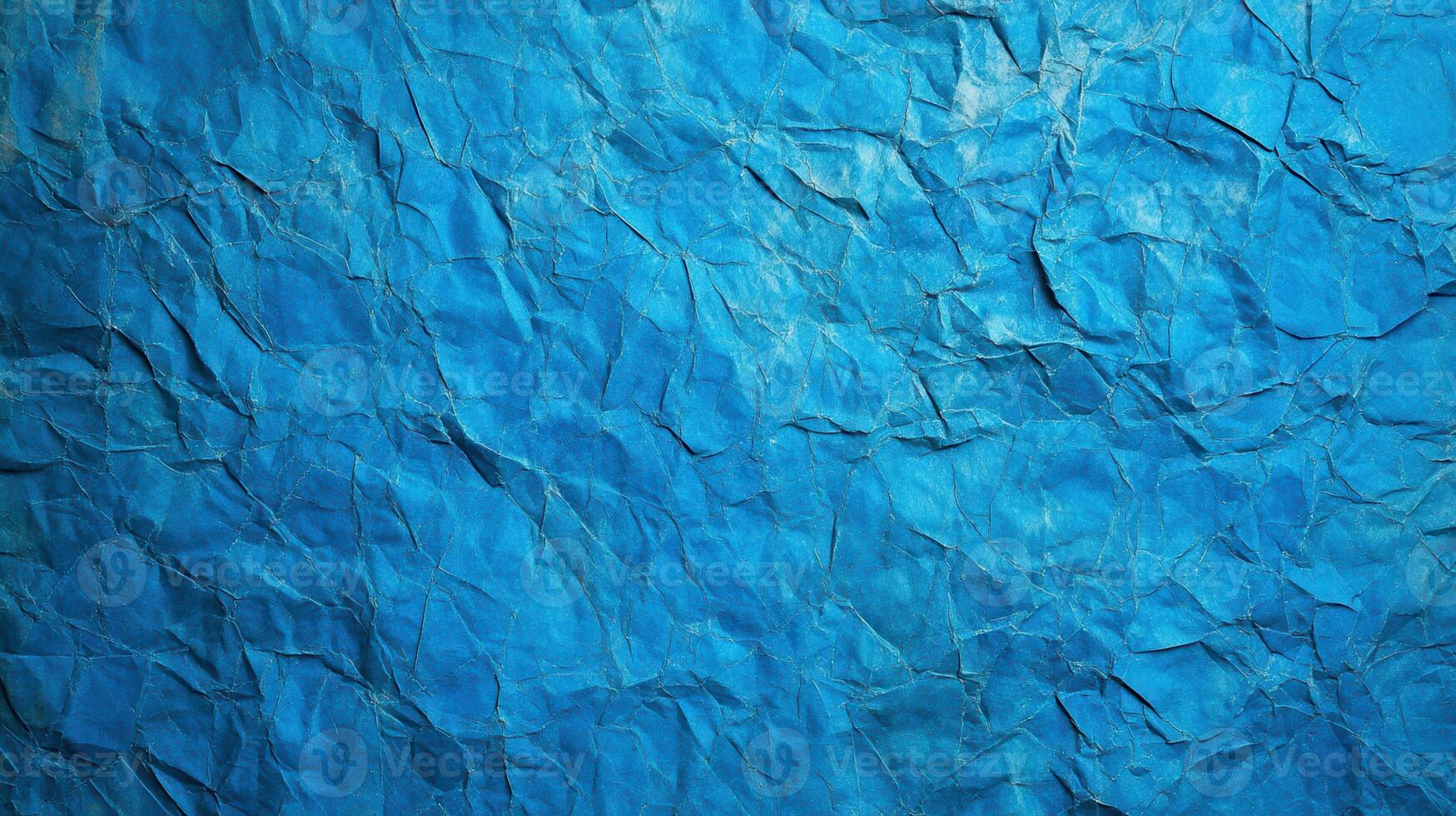 Blue crumpled paper texture background photo