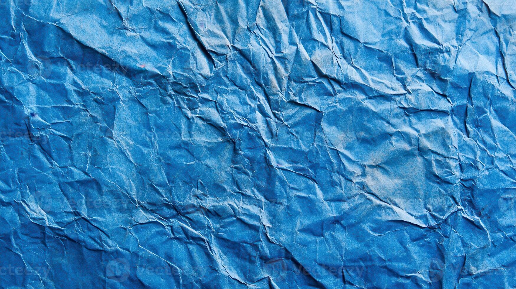 Crumpled blue paper texture background photo