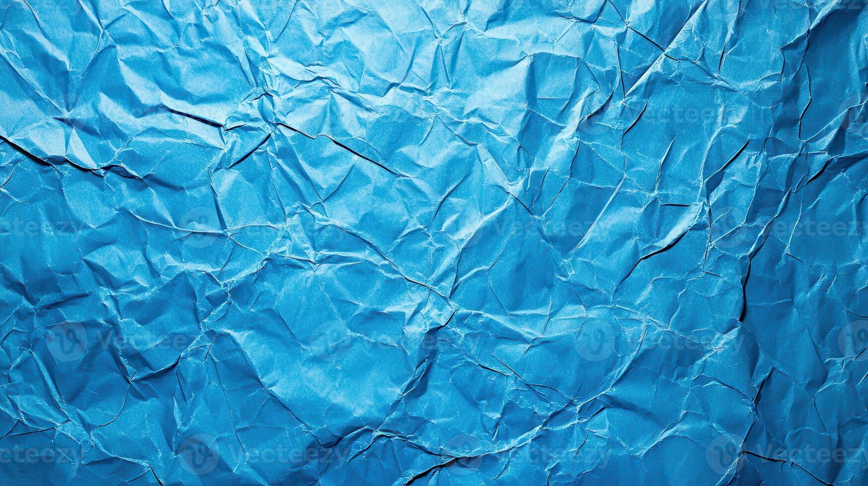 Crumpled blue paper background photo