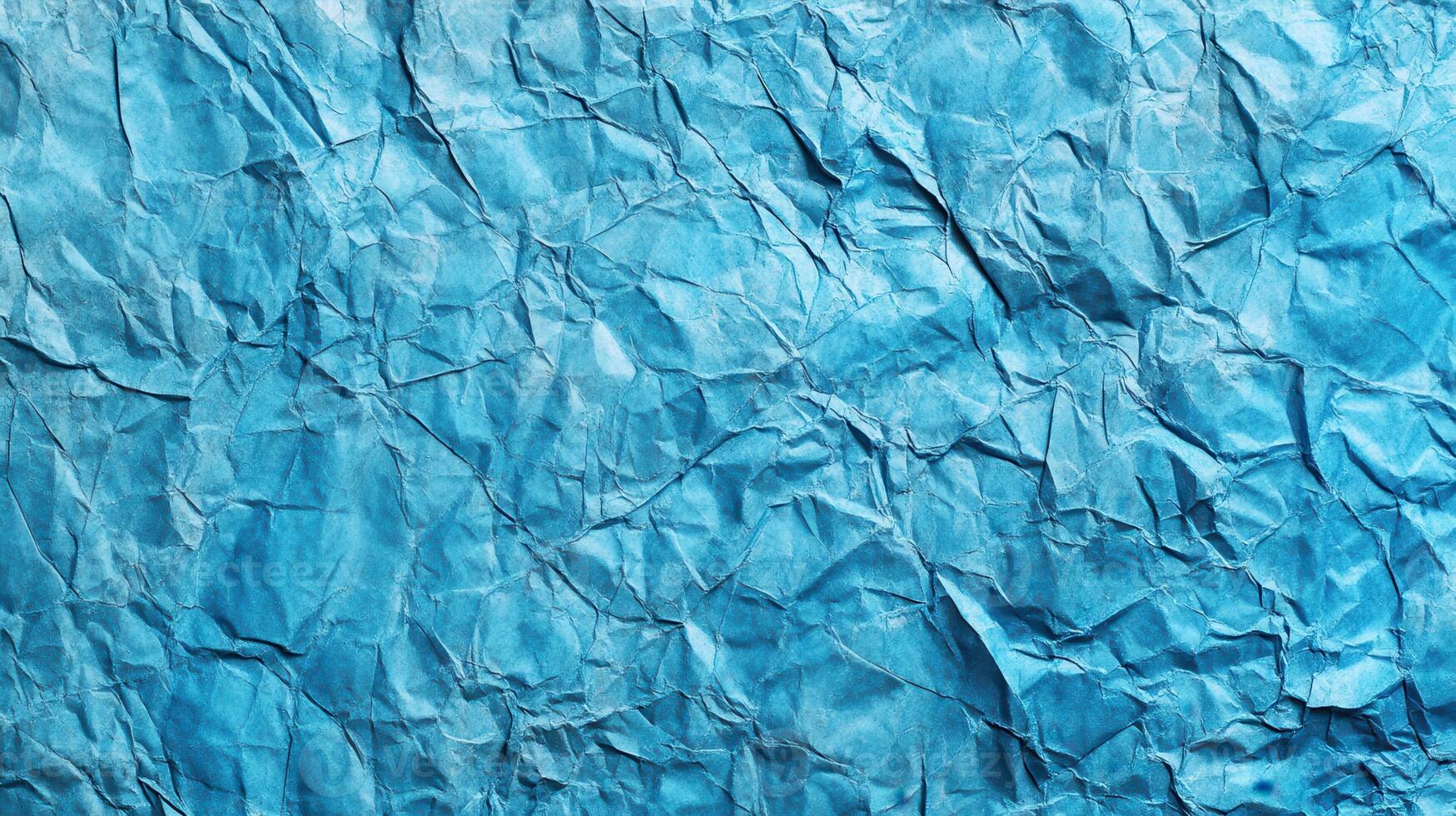Crumpled blue paper texture background photo