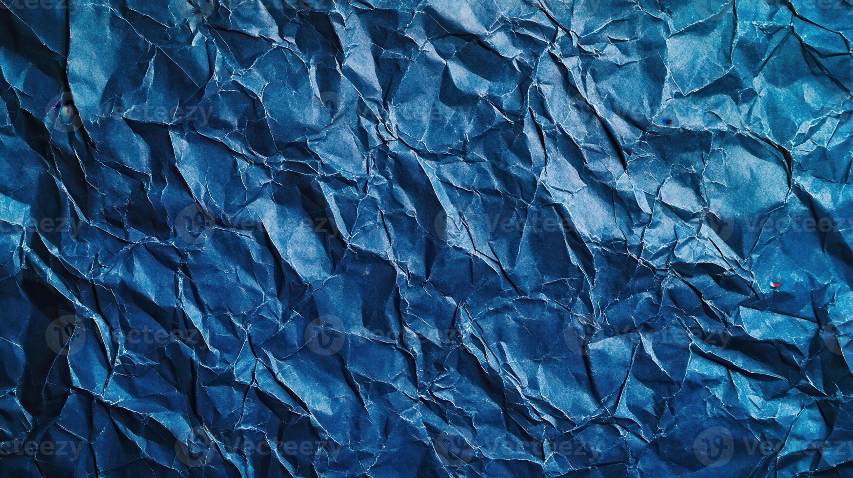 Crumpled blue paper texture background photo