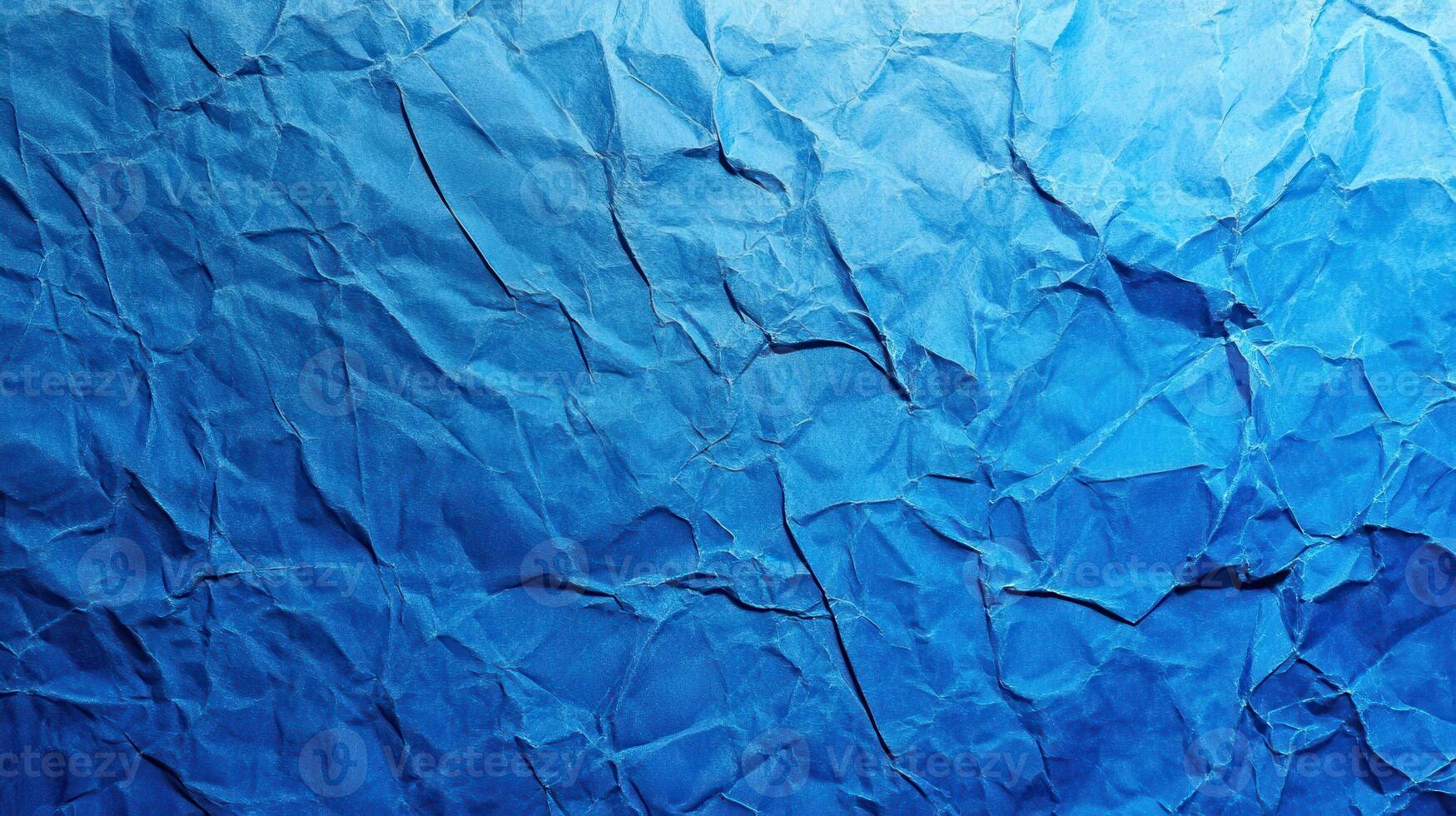 Crumpled paper background with blue color photo