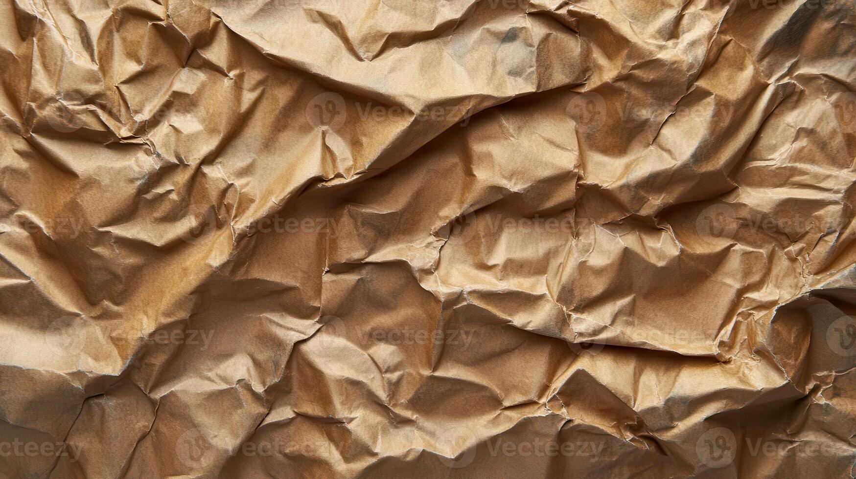 Crumpled brown paper background photo