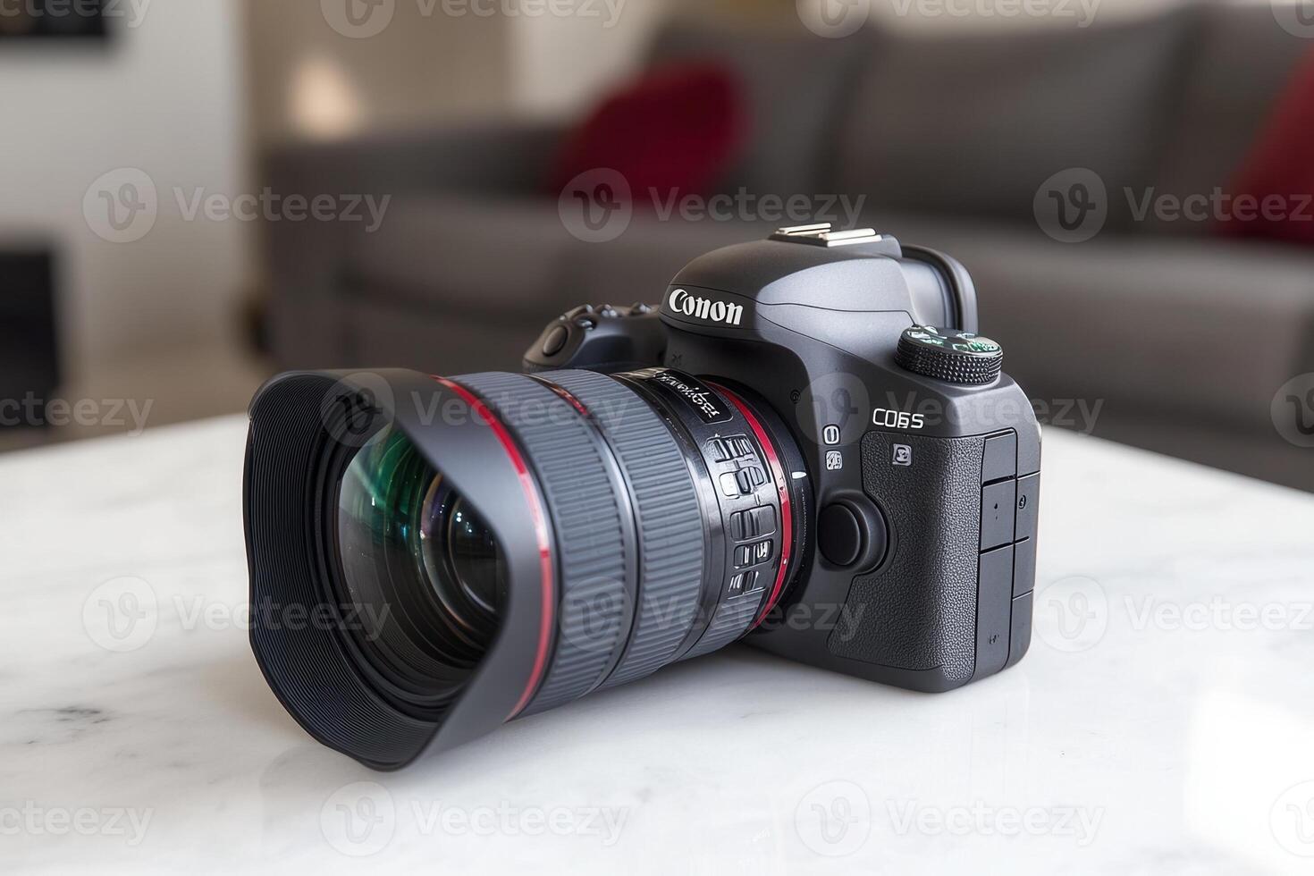 Camera with a large lens on a marble surface. photo