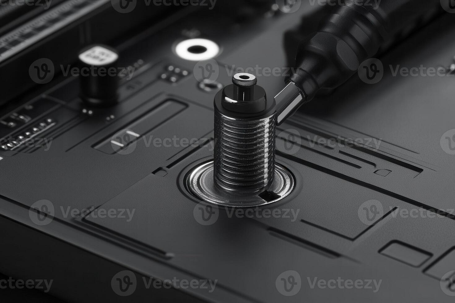 Close-up of a threaded connector on a circuit board. photo