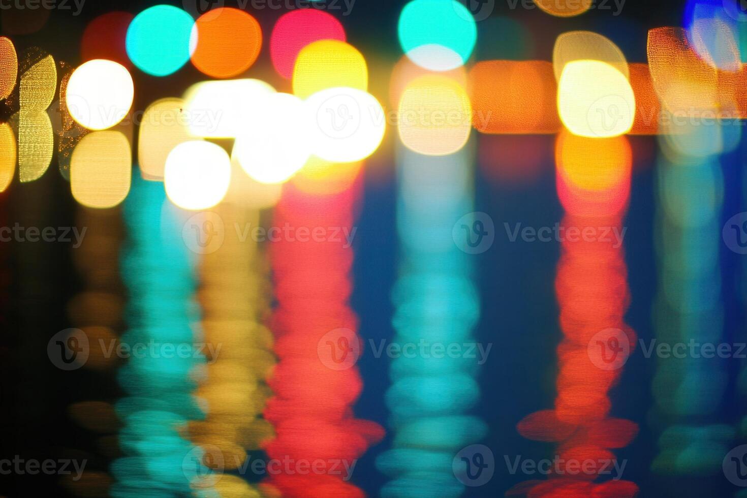 Blurry lights reflecting on water create a colorful scene. photo