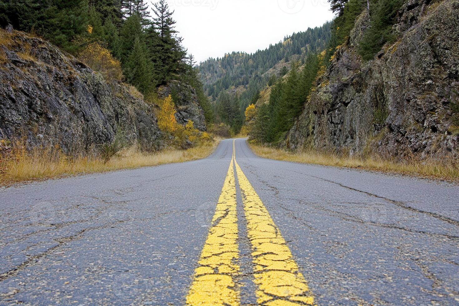 A winding road through a mountainous landscape. photo