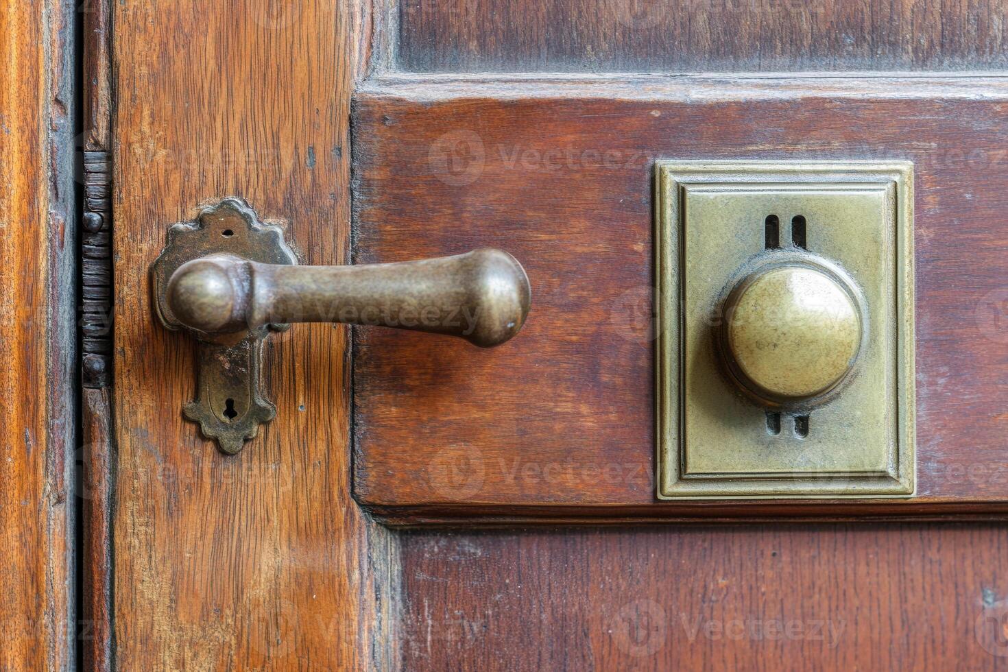 Close-up of a vintage wooden door handle and knob. photo