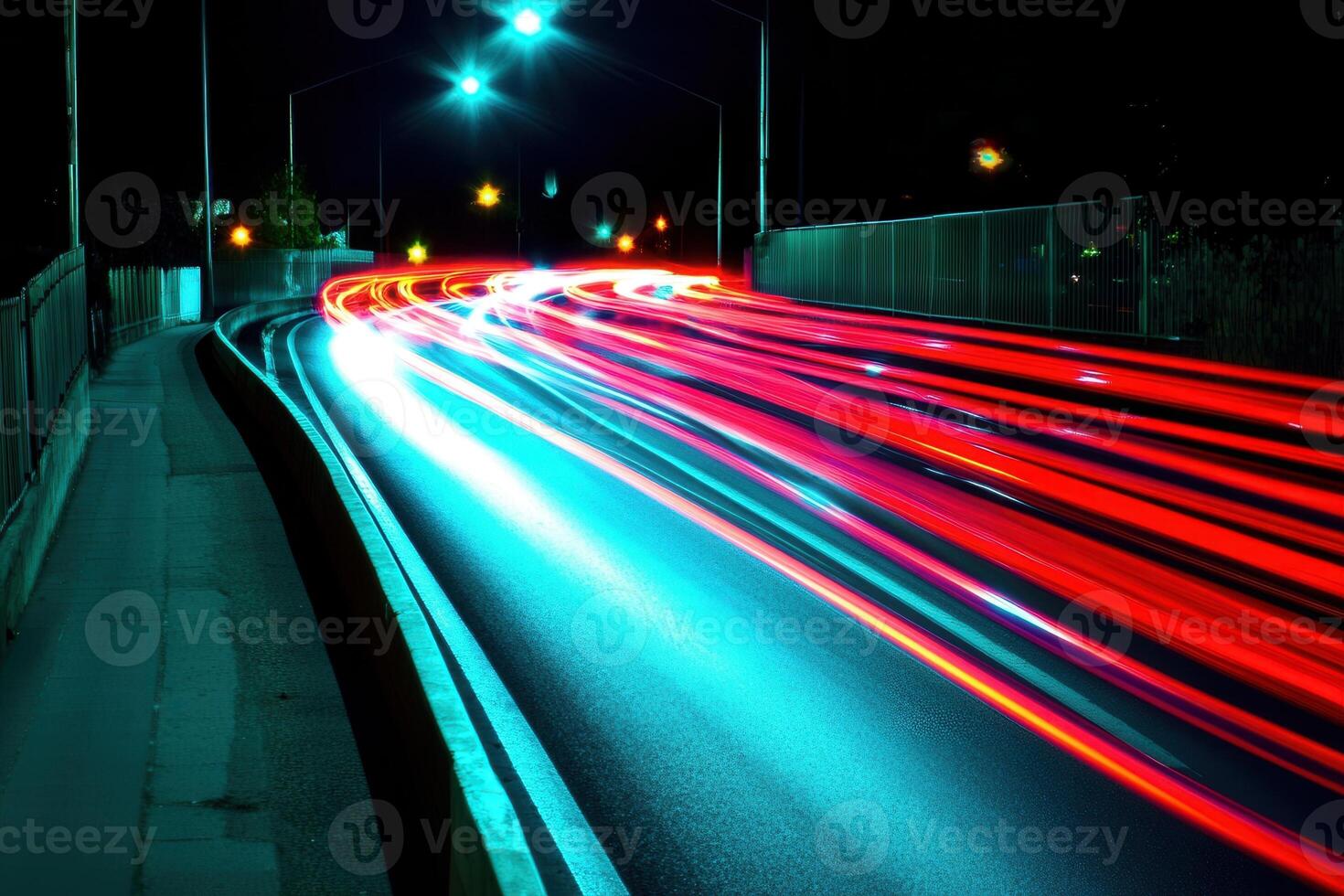 Nighttime long exposure of car lights on a road. photo