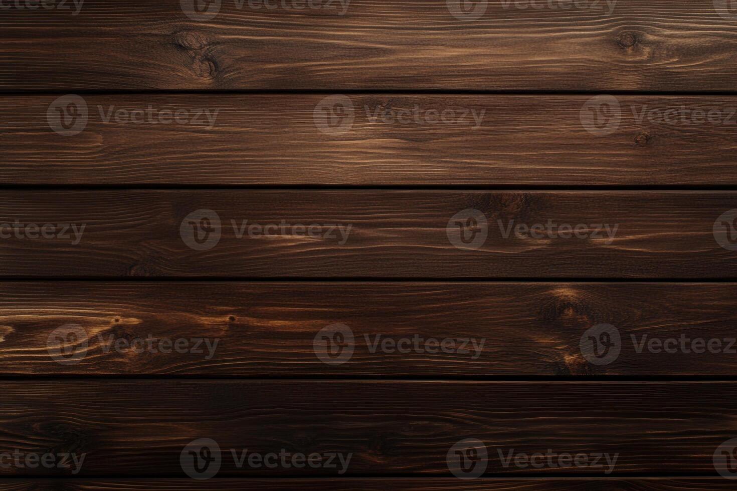 Dark wooden planks create a rustic background texture. photo