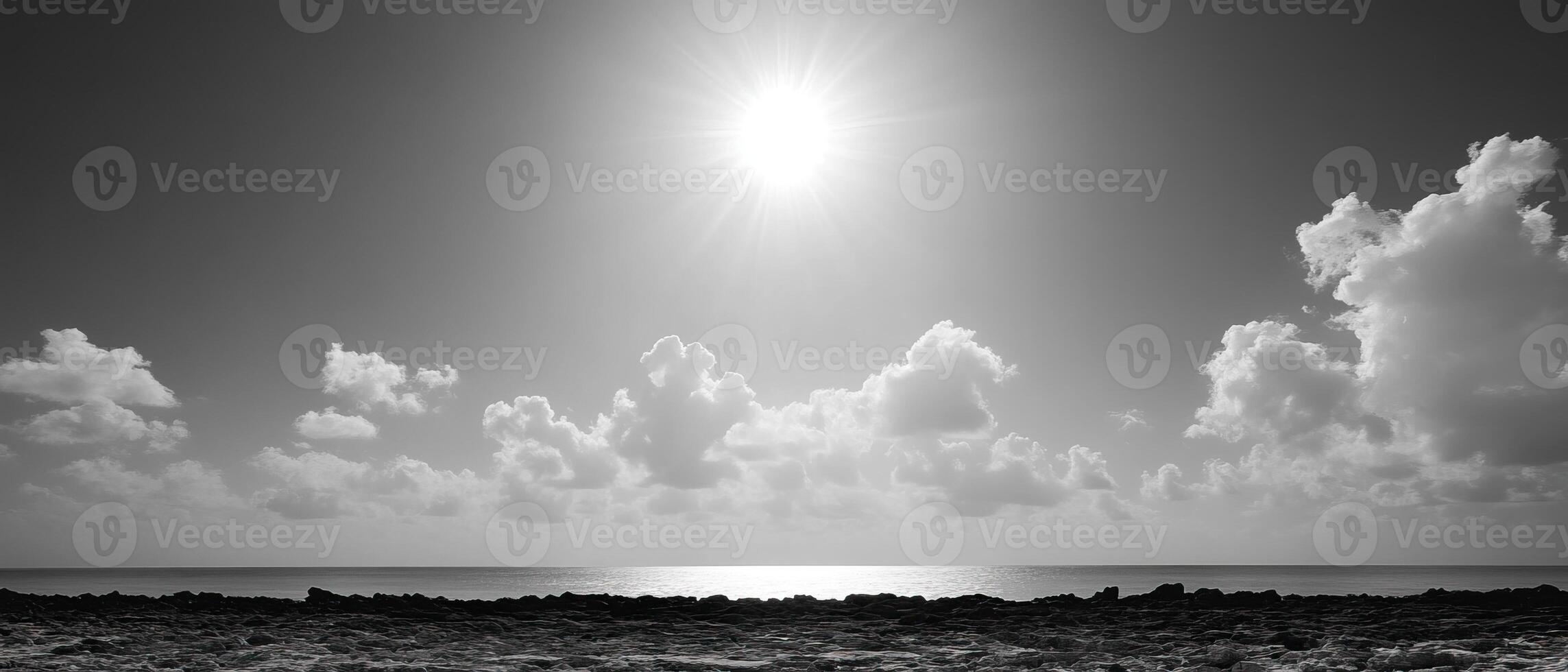 Bright sun, coastal cloudscape, ocean view photo