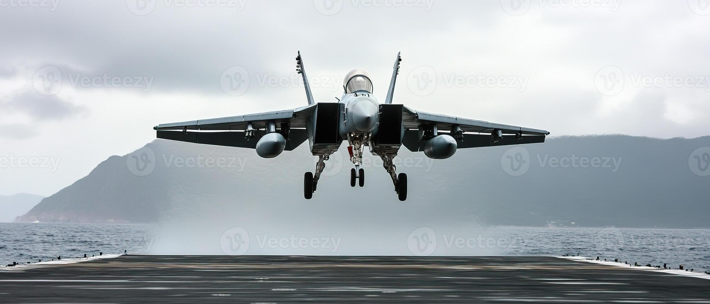 A fighter jet taking off from an aircraft carrier photo