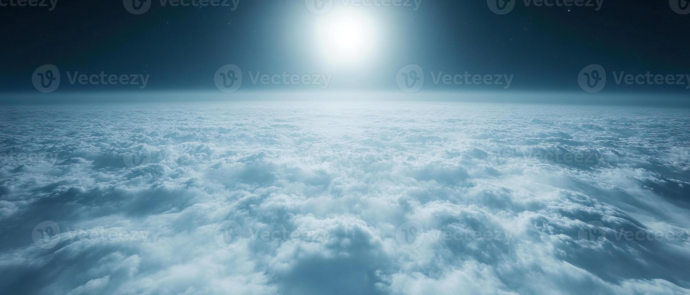 Aerial view Sunlit cloudscape, high altitude, nighttime sky photo