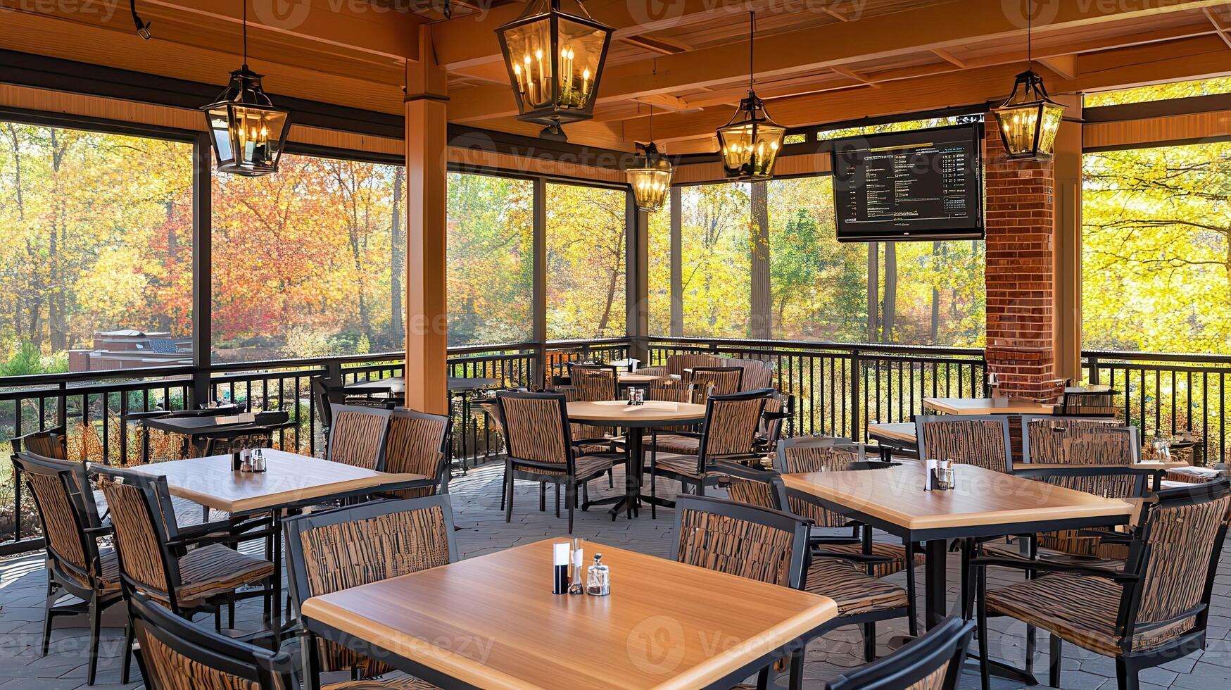 Autumn patio dining, fall foliage view, screen enclosure photo