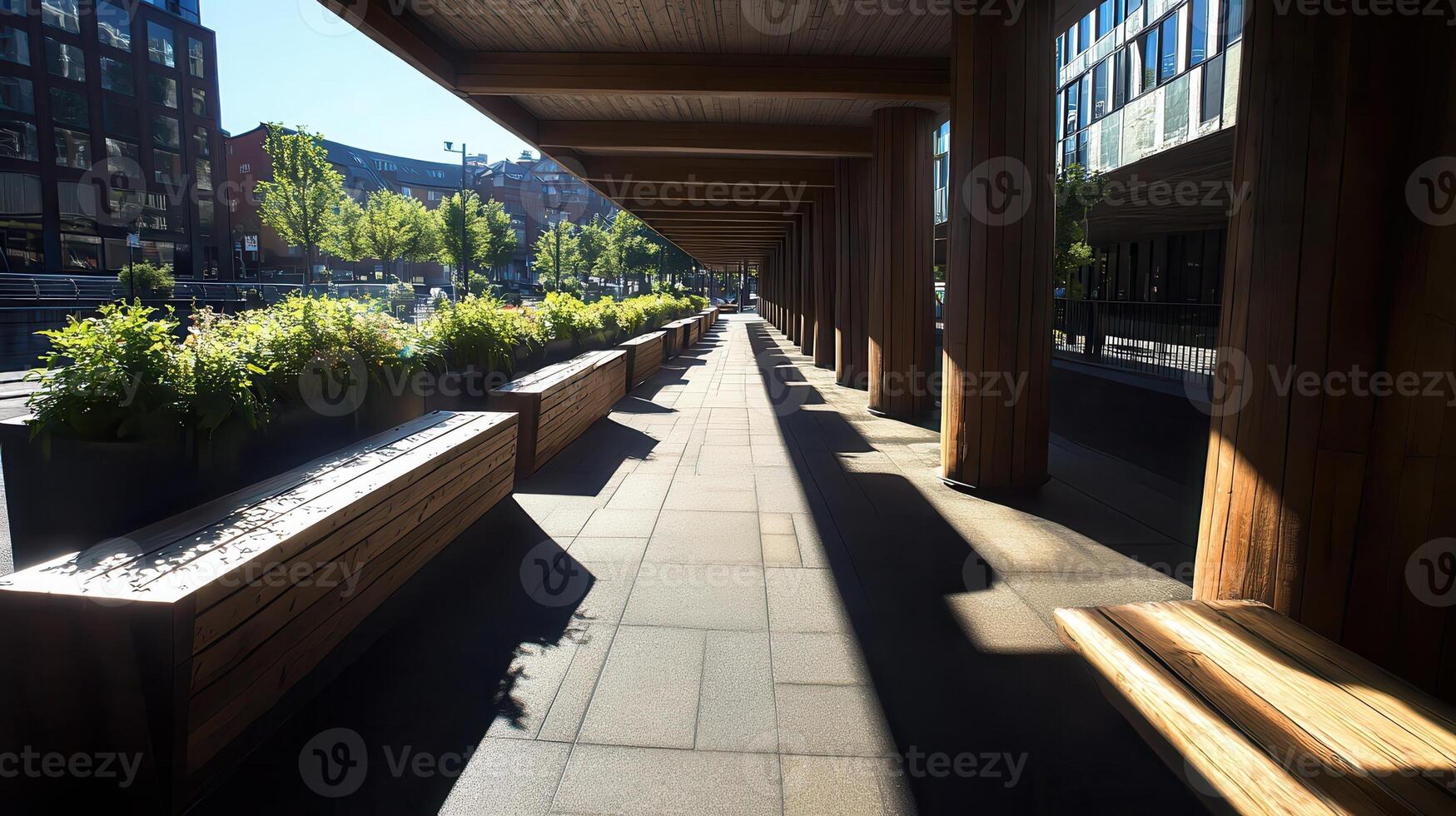 A long walkway with benches and plants on it photo