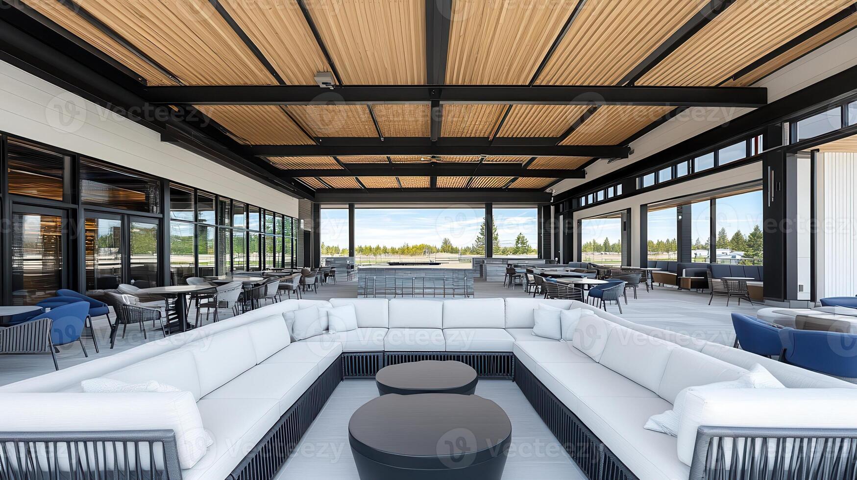 Outdoor patio lounge, golf course view, relaxing seating photo