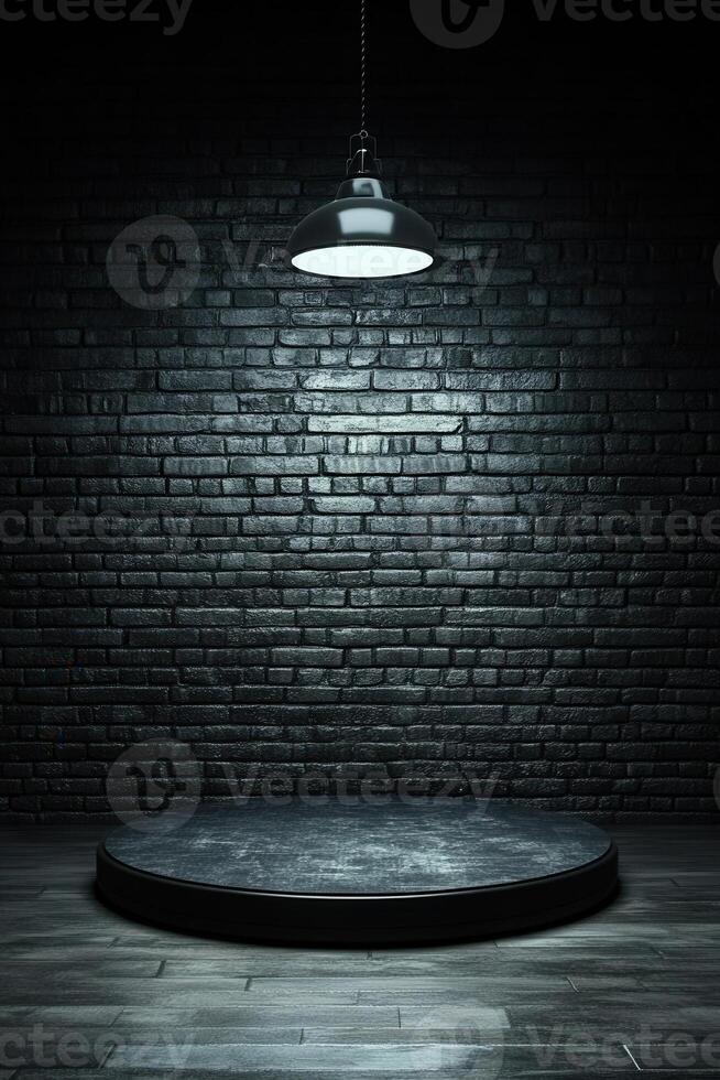 Dark, empty stage with brick wall and hanging lamp photo