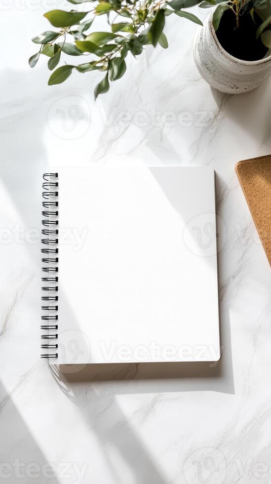 Blank Notebook on Marble Surface - Minimalist Aesthetic photo