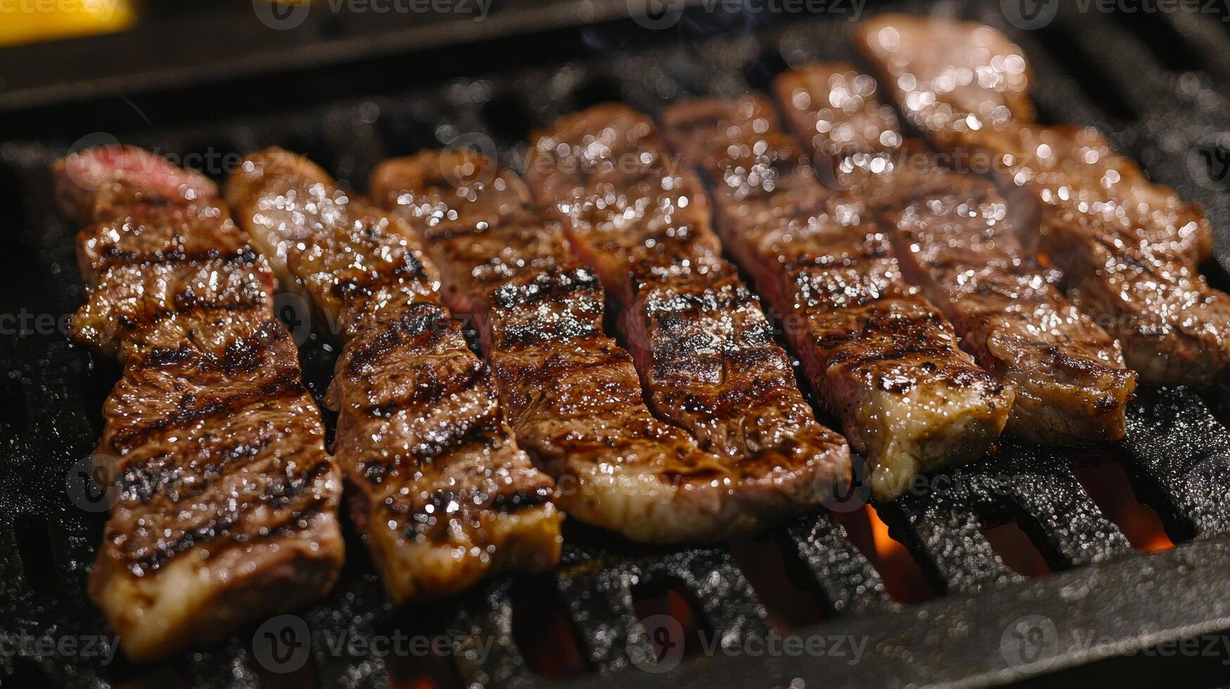 Grilled Beef Steaks on the Hot Grill photo
