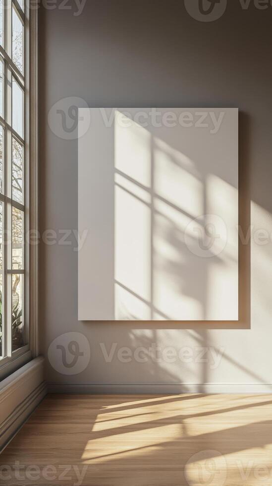 Empty Frame in a Modern Interior with Sunlight and Shadow photo