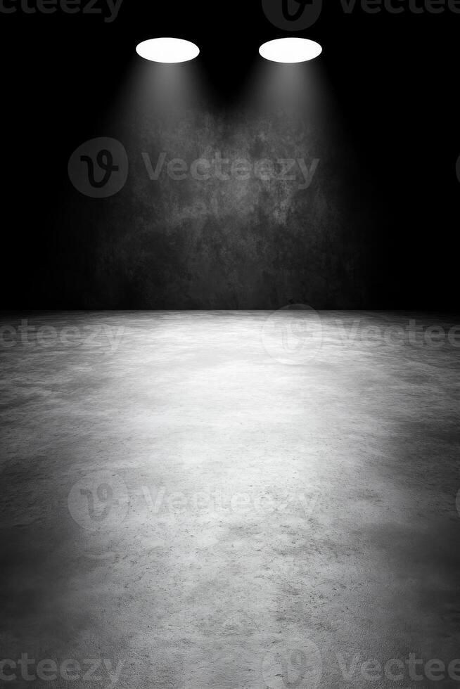 Empty Dark Room with Two Spotlights Illuminating Concrete Floor photo