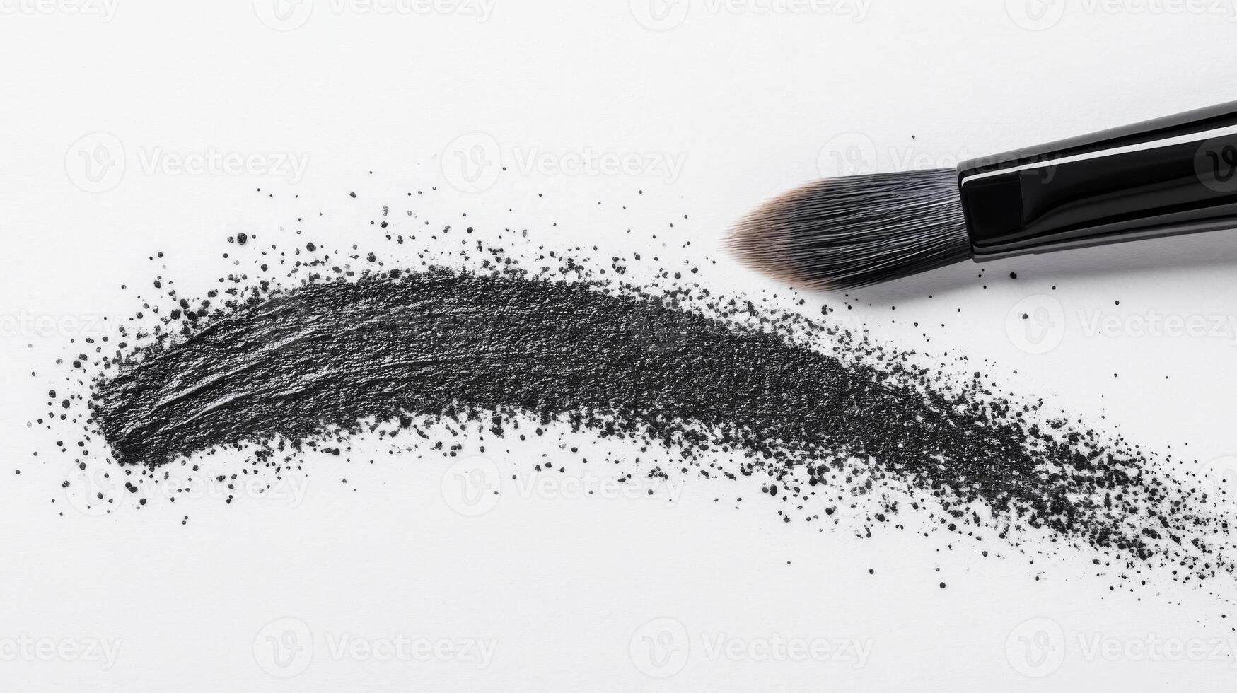 Makeup brush with black powder stroke photo