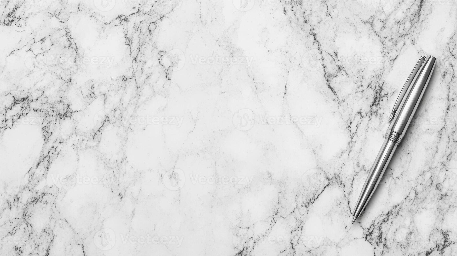 Silver Pen on Marble Surface photo