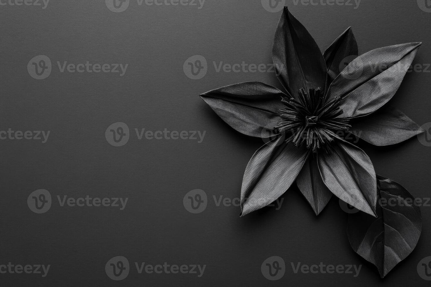 Sculpted leather flower in shades of gray photo