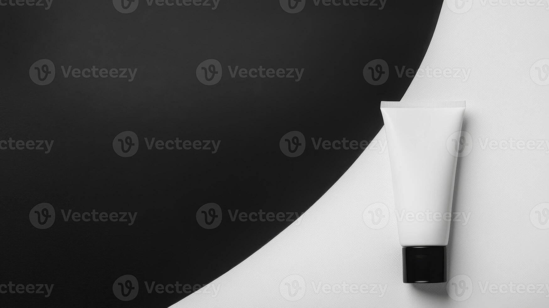 White Cosmetic Tube with Black Cap on Contrasting Background photo