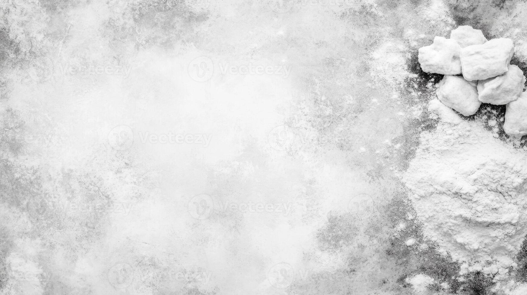 Textured grey background with white powder and fragments abstract composition photo