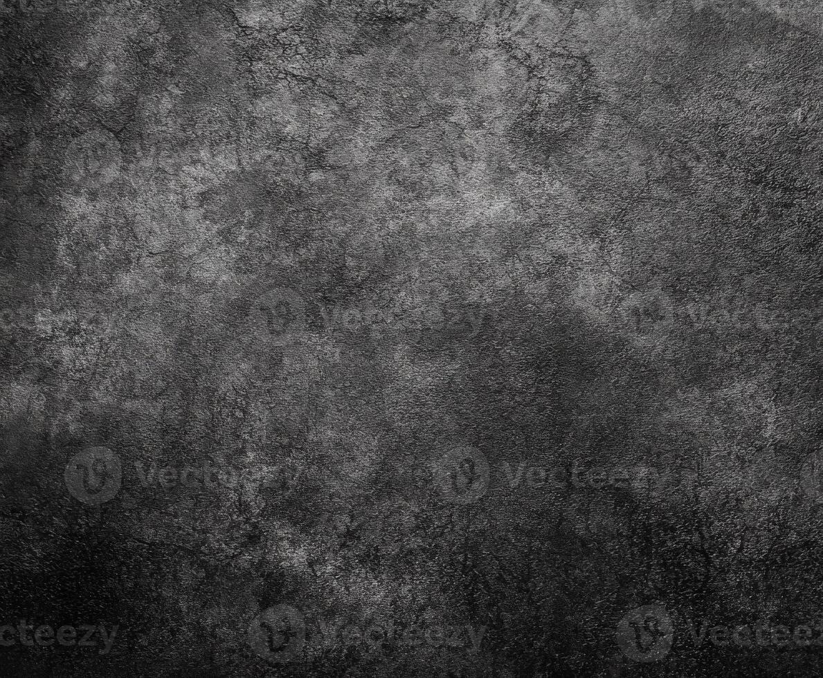 Dark textured surface with subtle variation in tone and shade photo