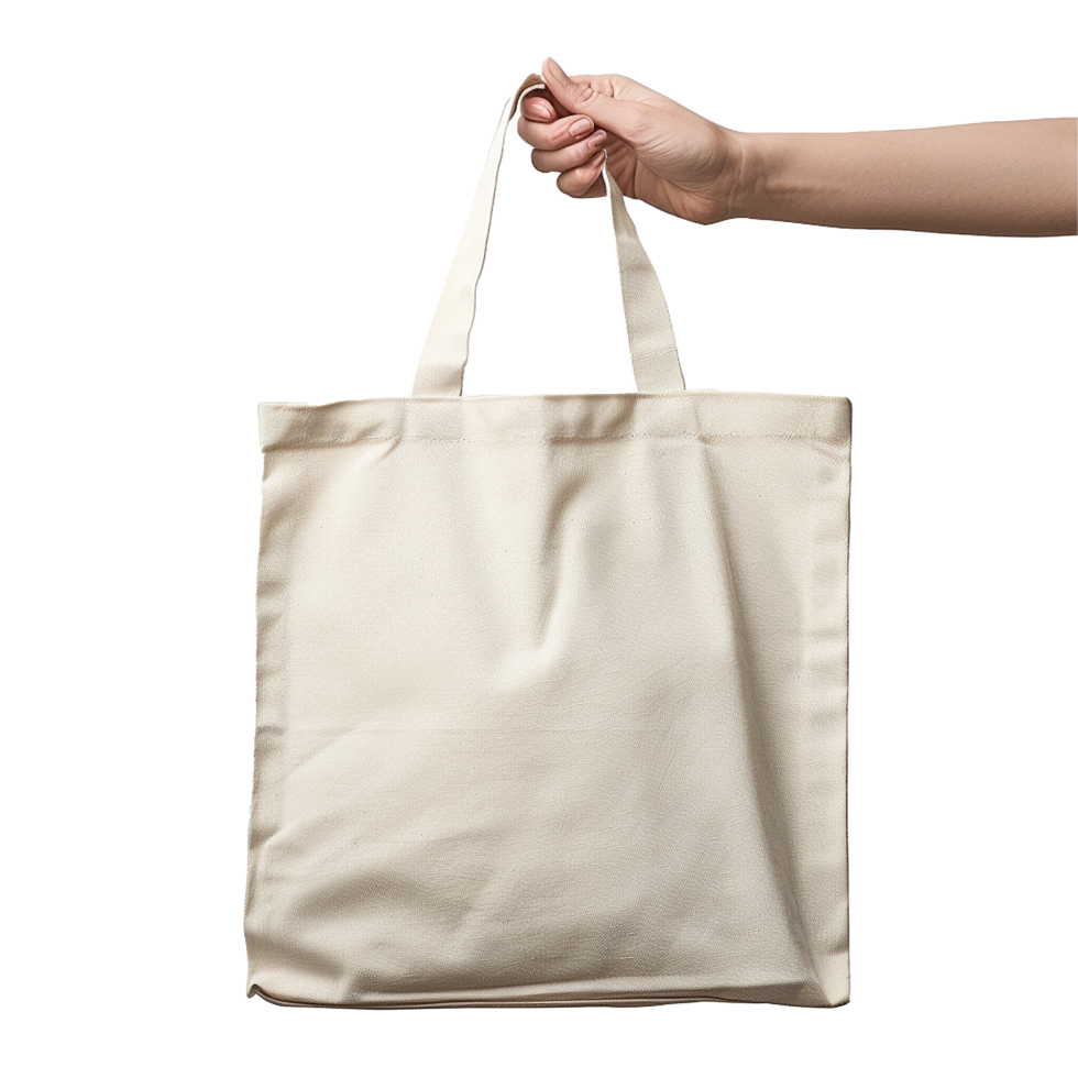 Hand holding a blank beige tote bag mockup png