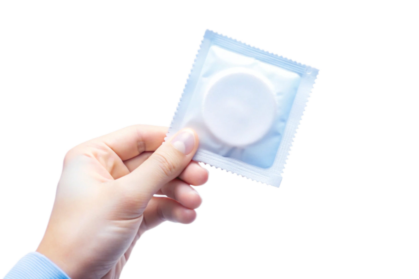 Hand holding a condom in its original packaging against a black background png