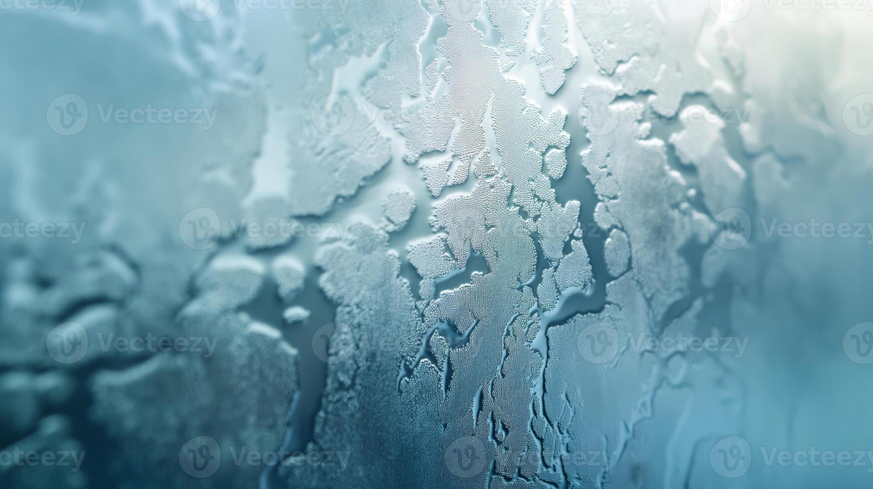 Abstract close-up of condensation on glass with a cool blue hue, creating a tranquil and serene atmosphere. photo