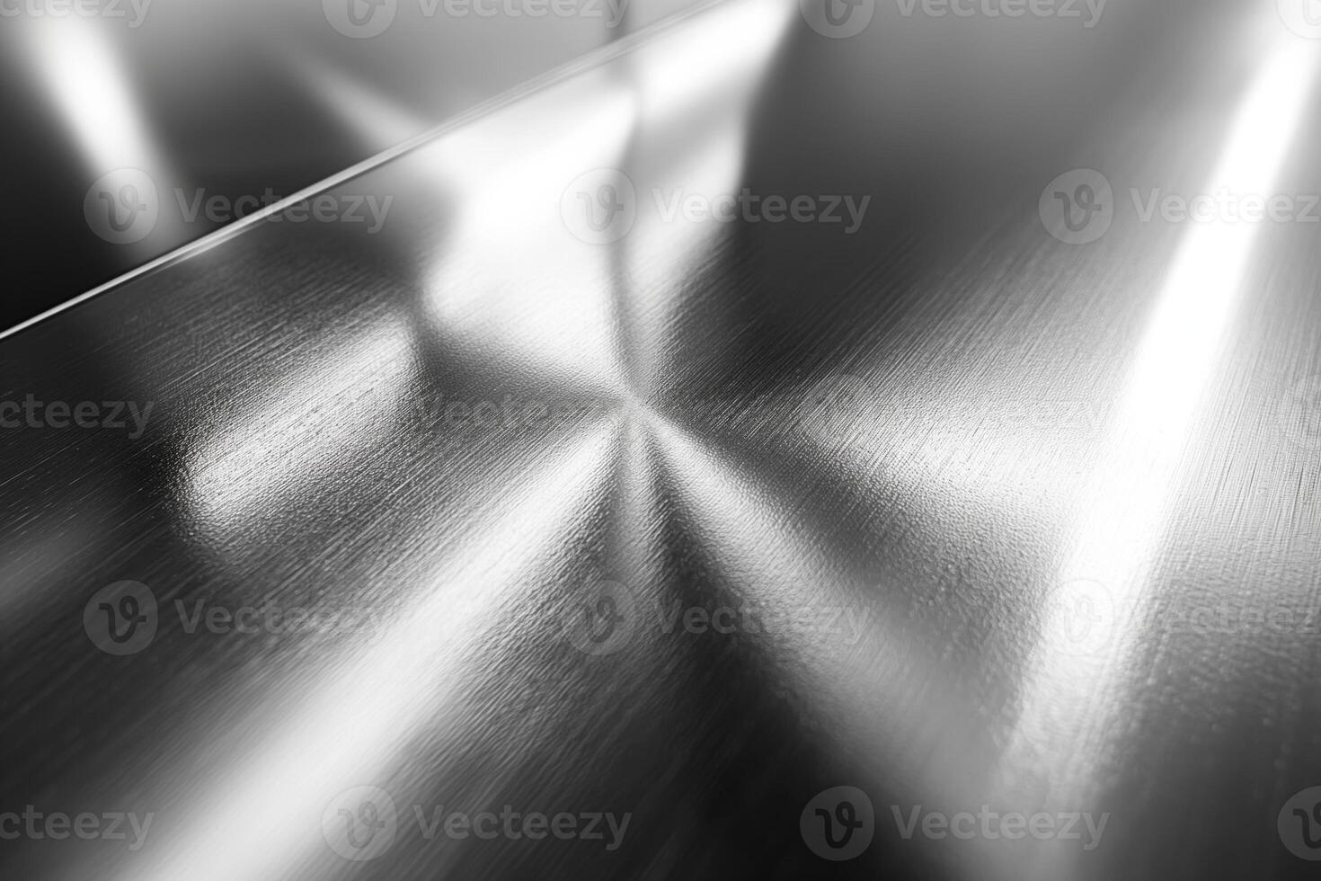 Close-up view of a brushed metallic surface, showcasing intricate patterns and reflections. photo