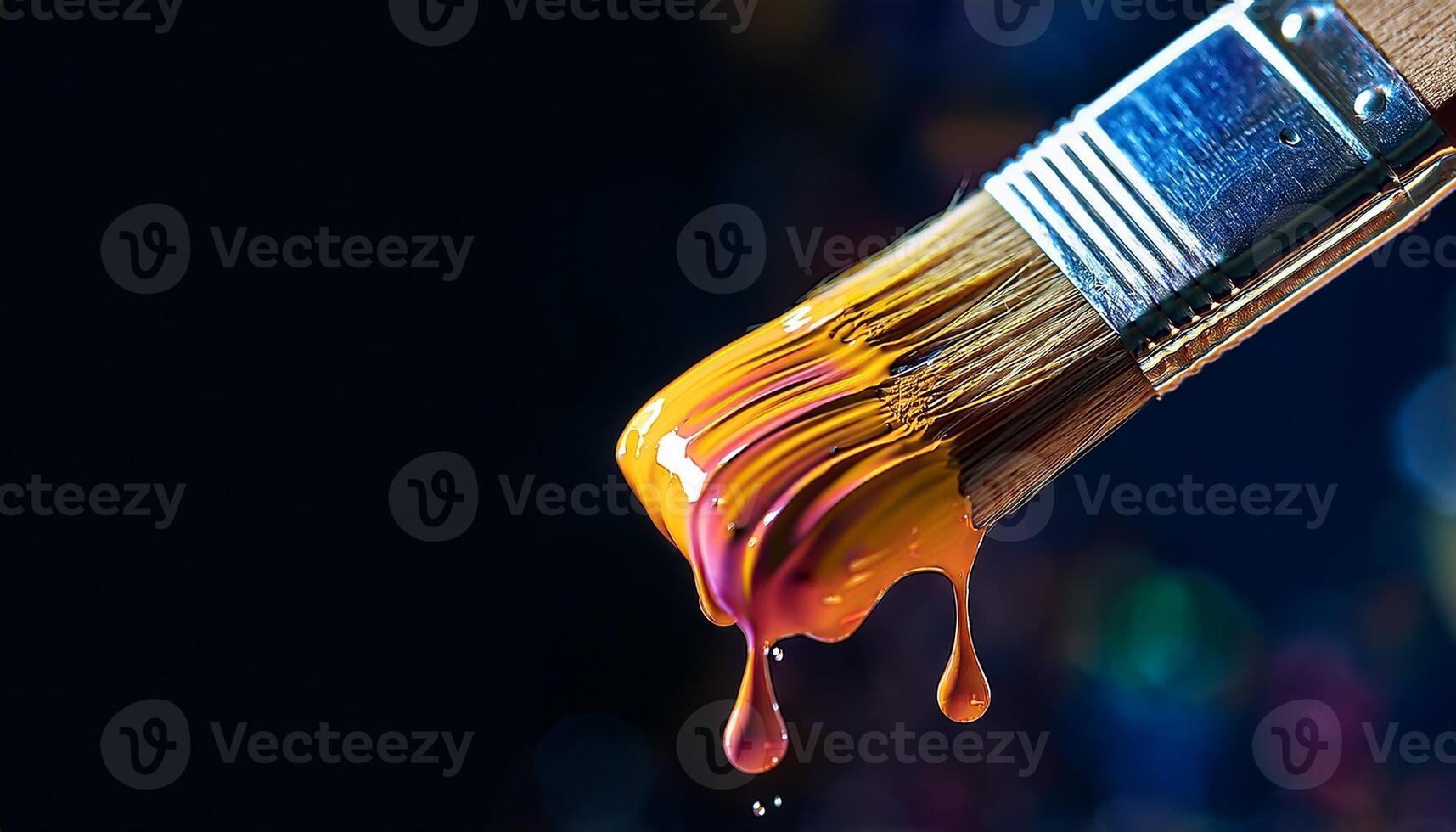 Vibrant Paintbrush Dripping With Bright Colors and Capturing the Essence of Artistic Creativity photo