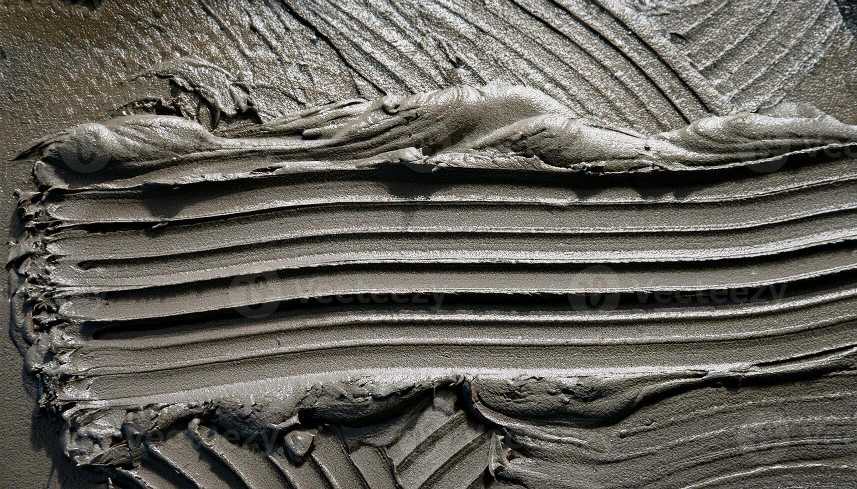 Textured Gray Surface Created by Applying Mortar in Precise, Even Strokes During a Construction Project photo