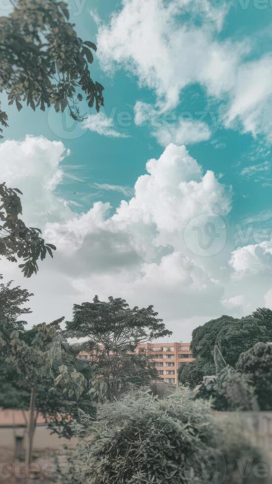 A view of a building with a clock tower in the background photo