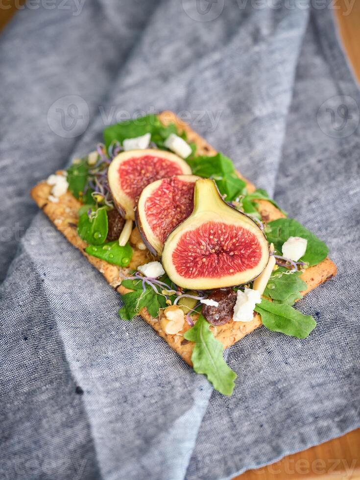 Delicious slices of fruits served on napkin photo