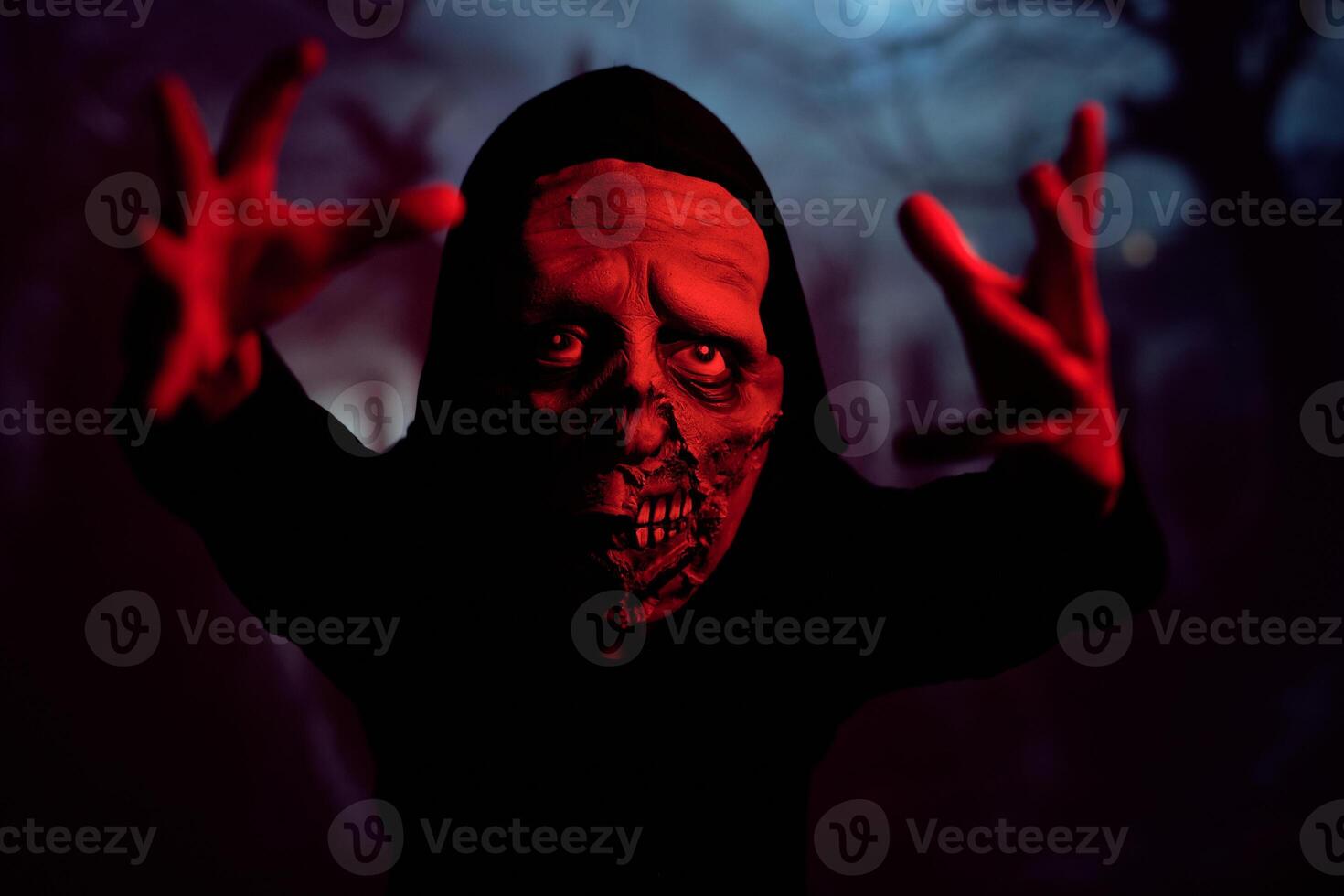 Spooky monster in red neon light photo