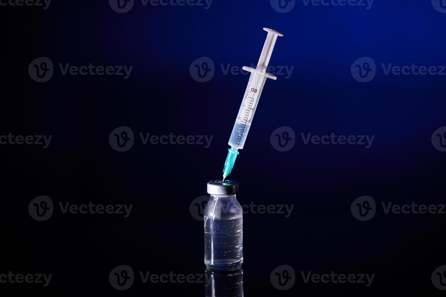 Injection with vaccine for COVID test in studio photo
