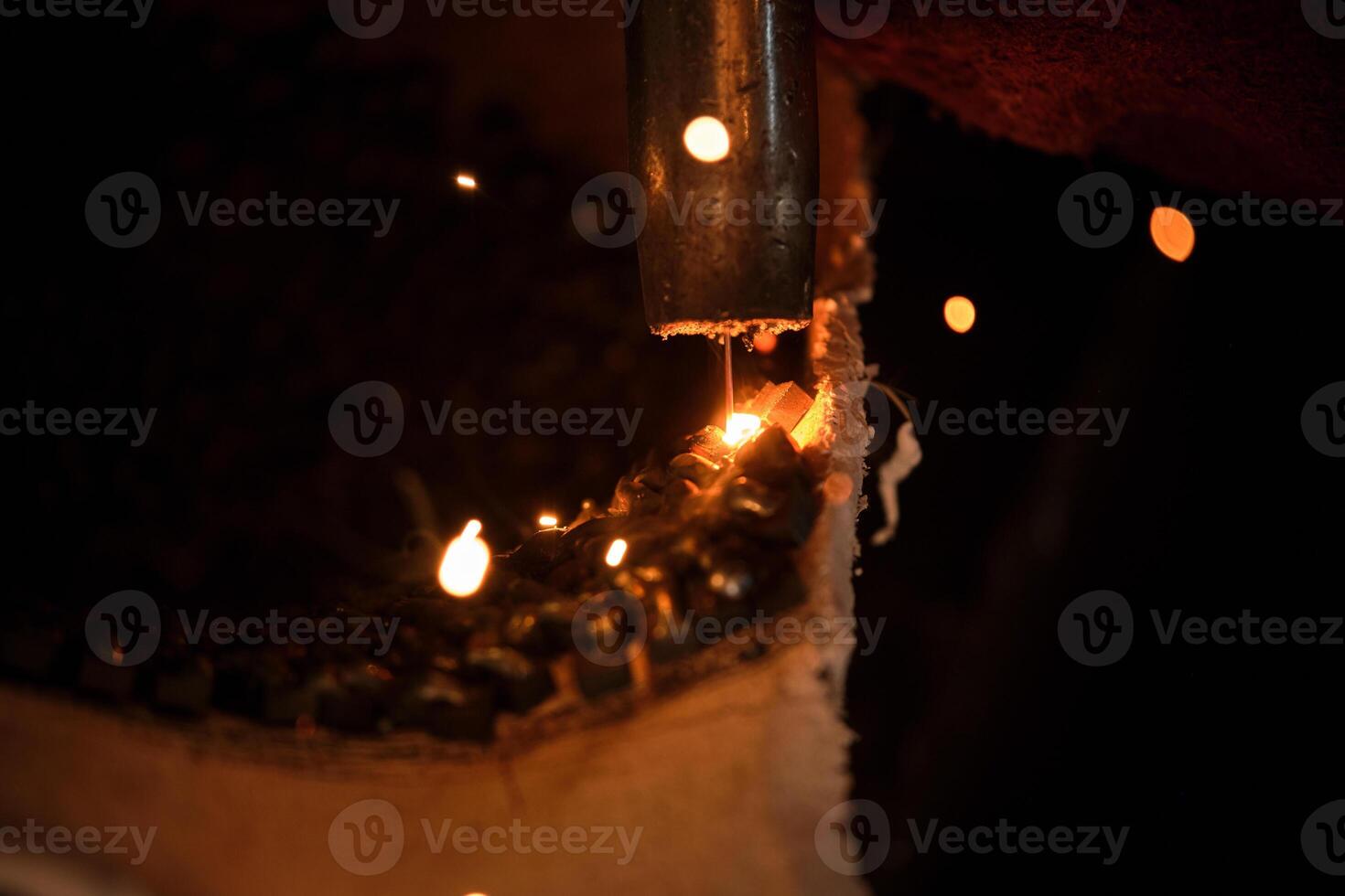 Professional tool welding metal on plaster photo