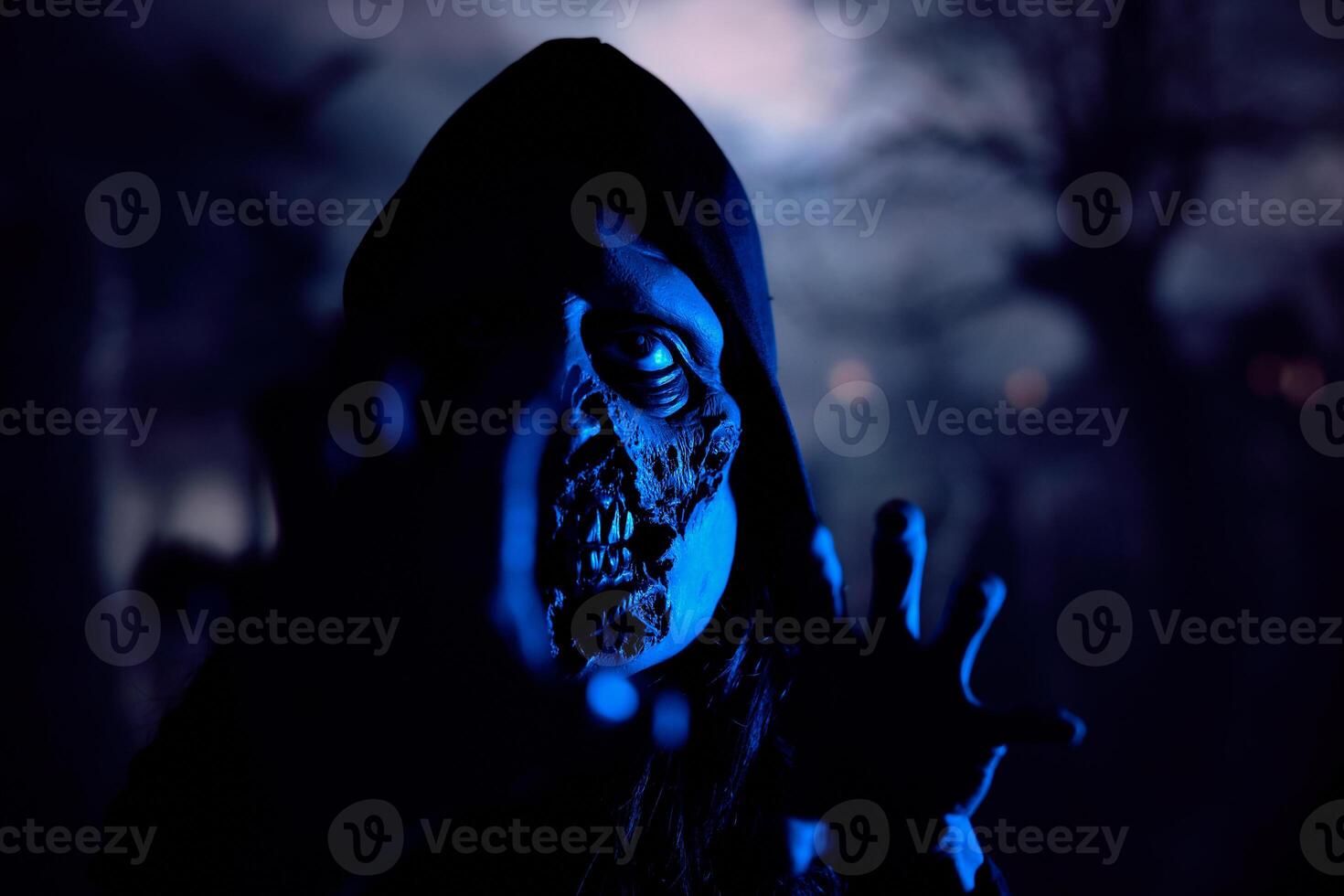 Horrible monster scaring camera at night photo