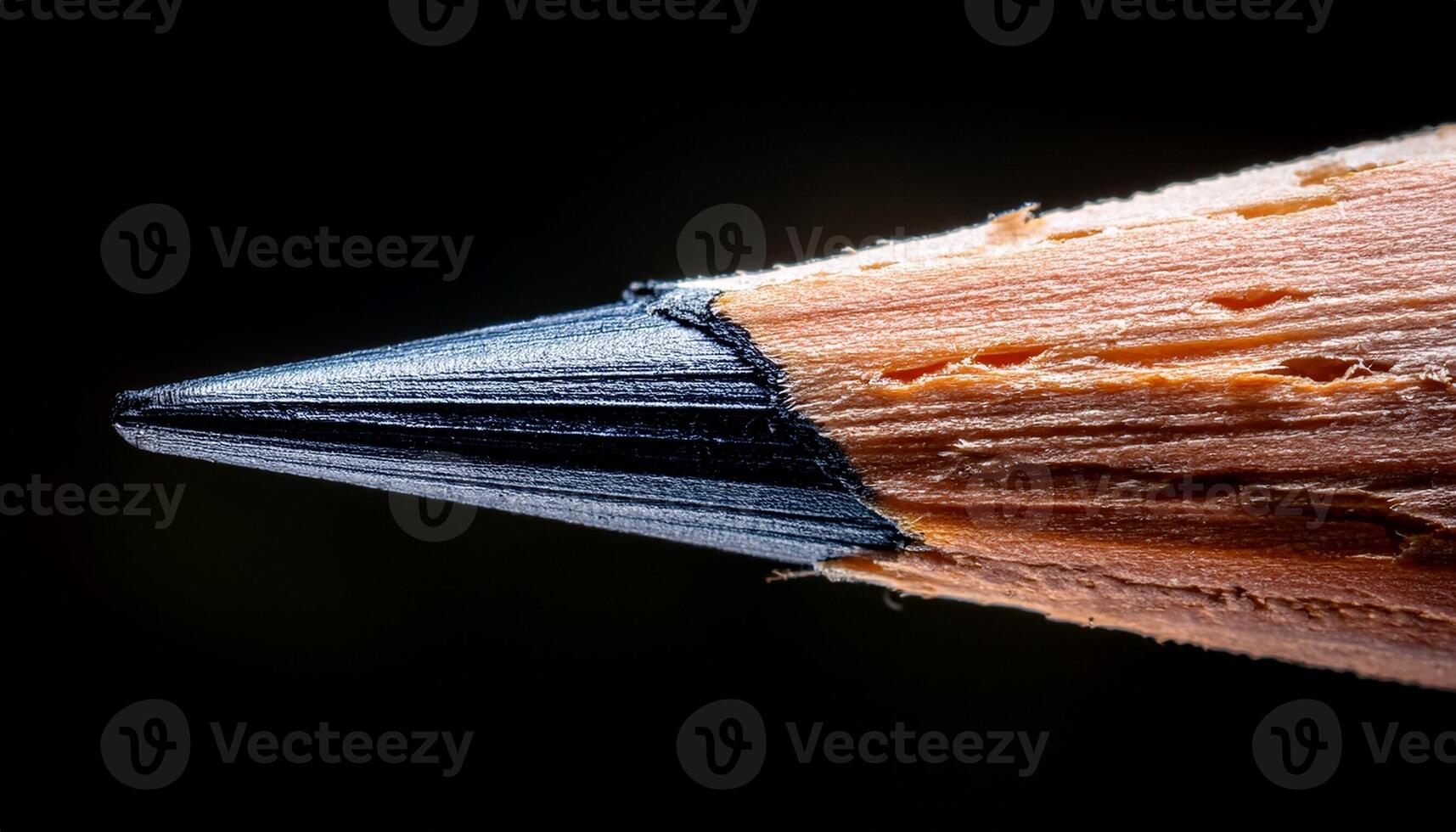 Close-up View of a Sharpened Pencil Tip Highlighting Wood Texture and Graphite photo