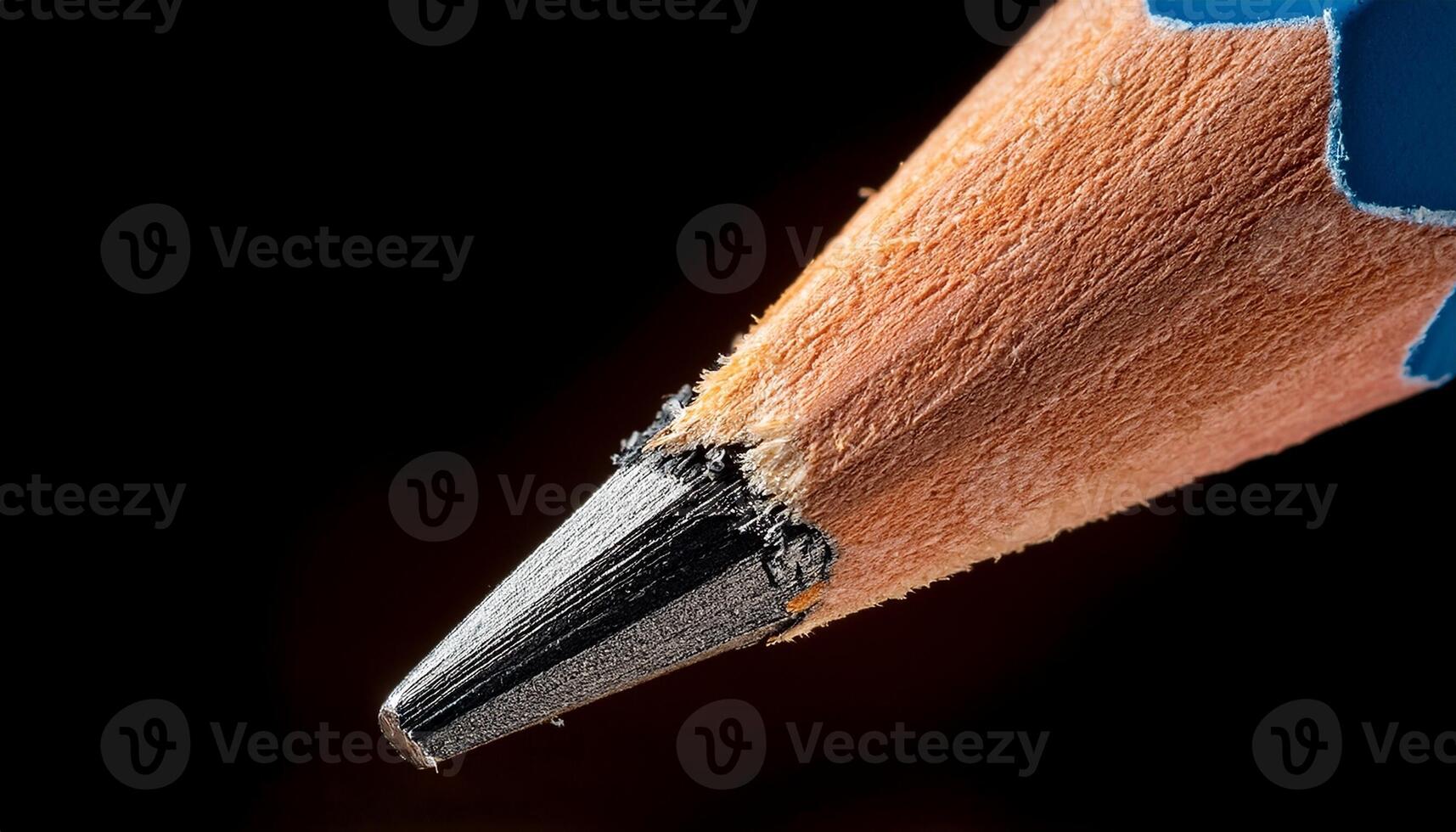 Close-up View of a Sharpened Pencil With a Worn Tip Showcasing Wood and Graphite Texture photo