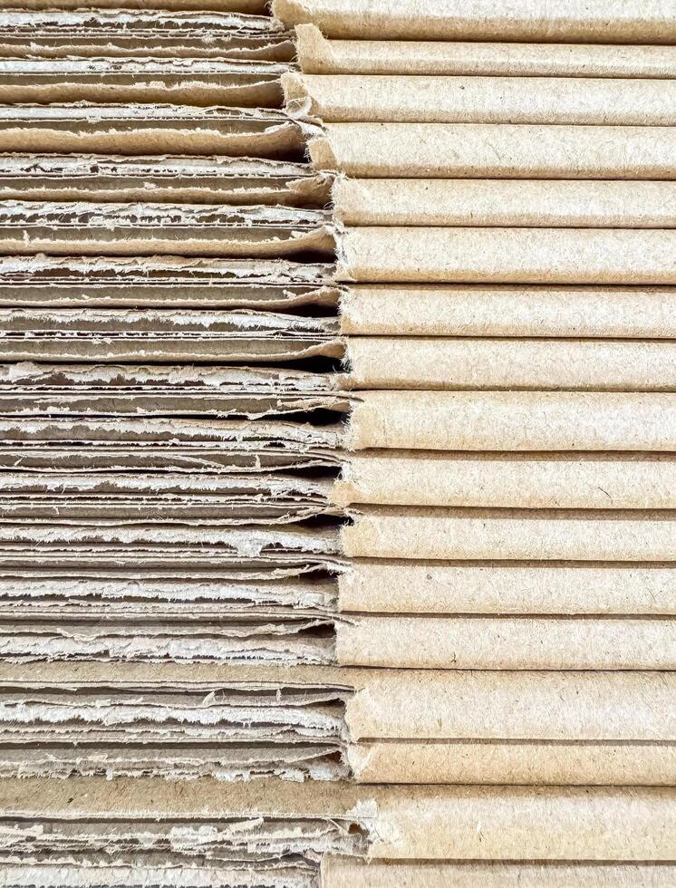 Stacked Corrugated Cardboard Sheets Showing Rough and Smooth Edges in Detail. High quality photo