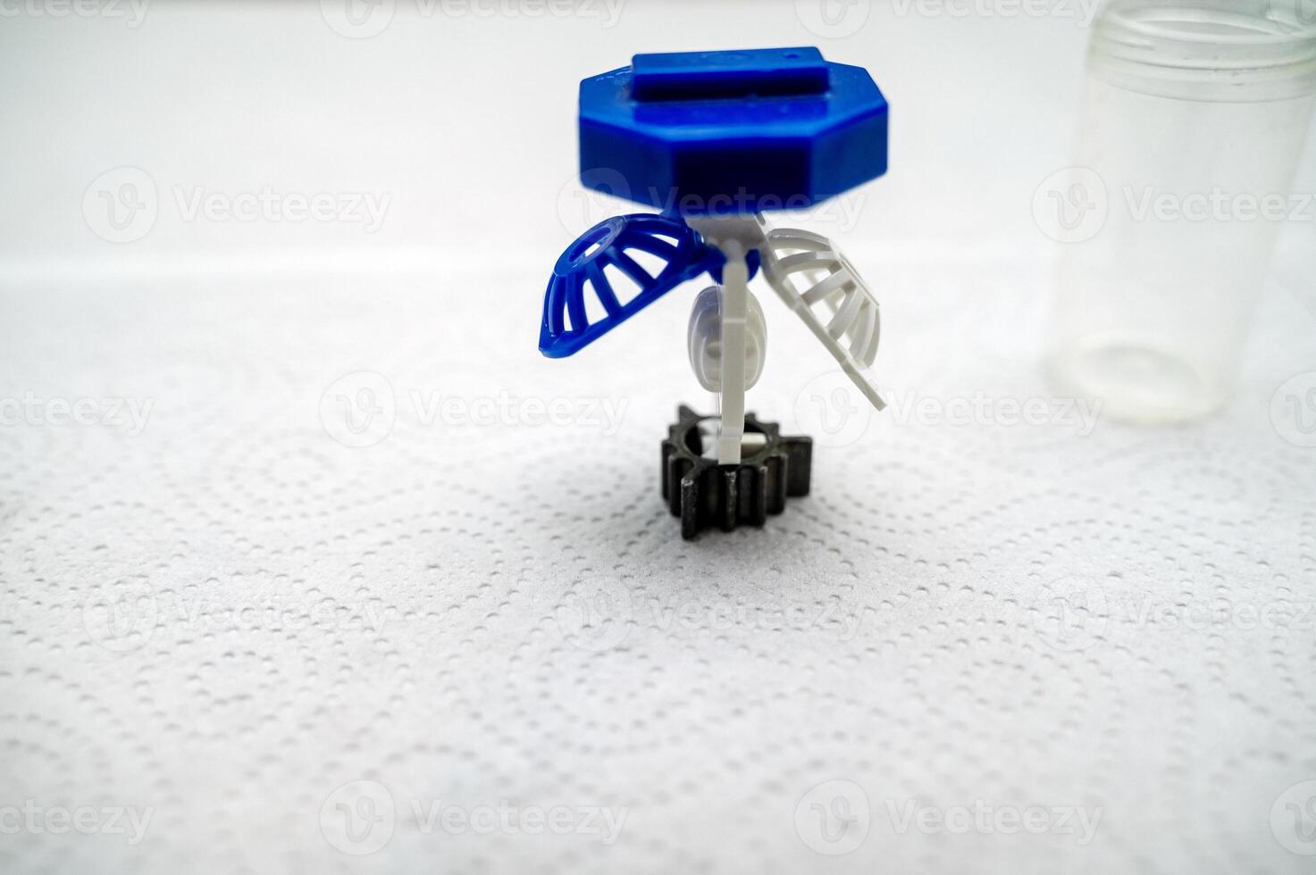 close-up of a container for cleaning and storing contact lenses for the eyes, used at home. For soft and hard lenses. The container consists of two parts, the first for lenses, open photo
