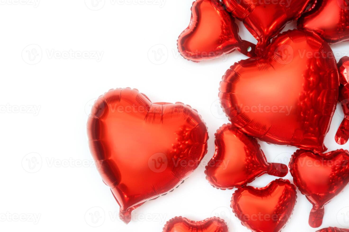 White background for text and foil balloons in the shape of hearts. Balloons of various sizes from large to small hearts. Balloon hearts are located on the right side of the background. photo