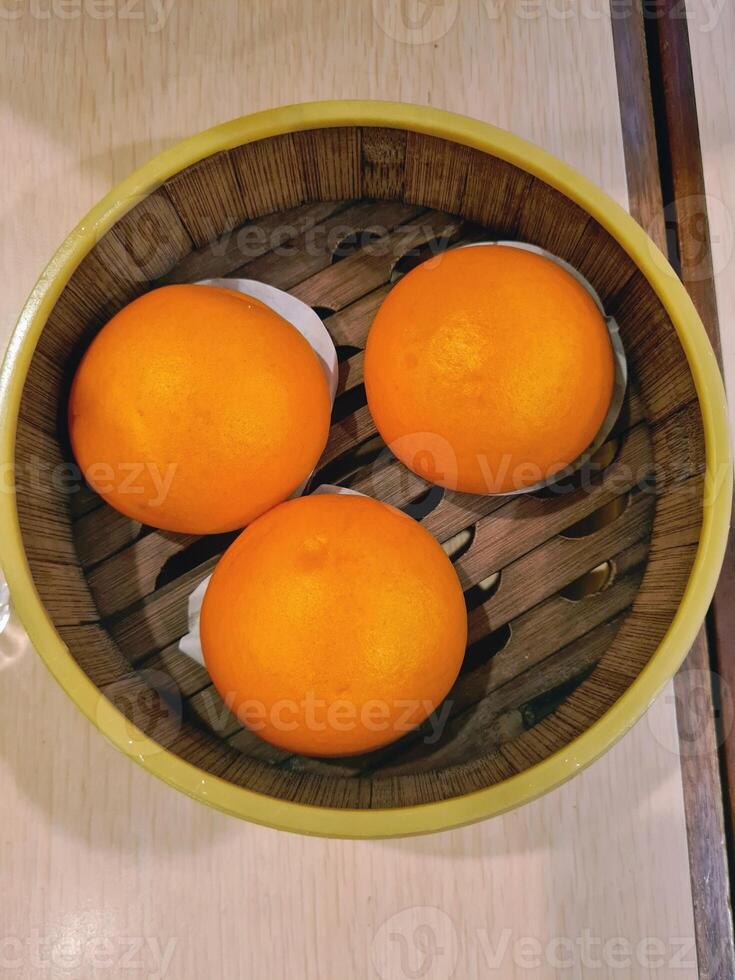 A bowl of oranges photo